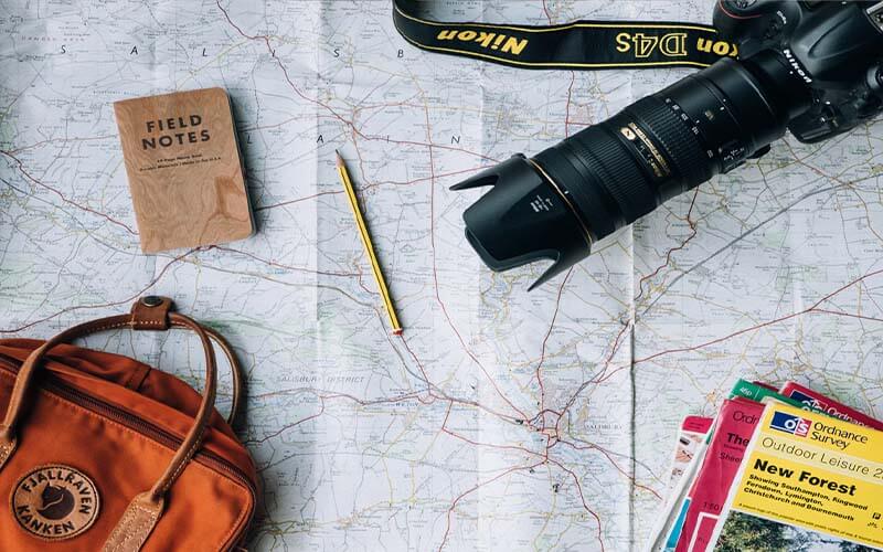 Travel map with camera, planning a trip
